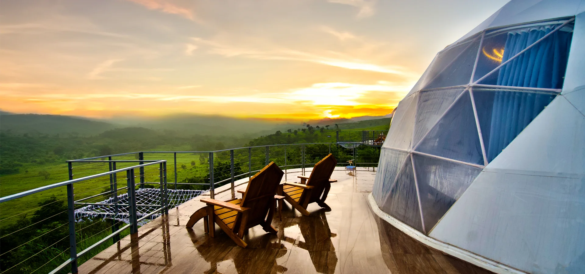 Sunset over ridge deck and cantilevered infinity hammock